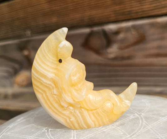 Orange Calcite Mermaid On Moon